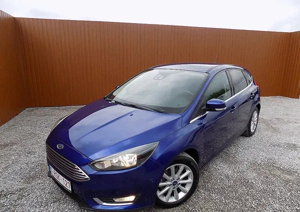 samochody osobowe Ford Focus cena 37900 przebieg: 142000, rok produkcji 2015 z Świdnik